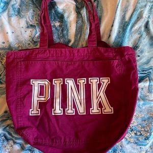 VS PINK zippered tote bag.